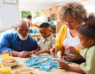 family doing a puzzle