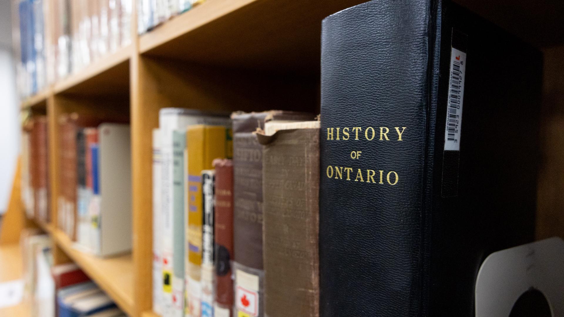 History of Ontario book on a library shelf.