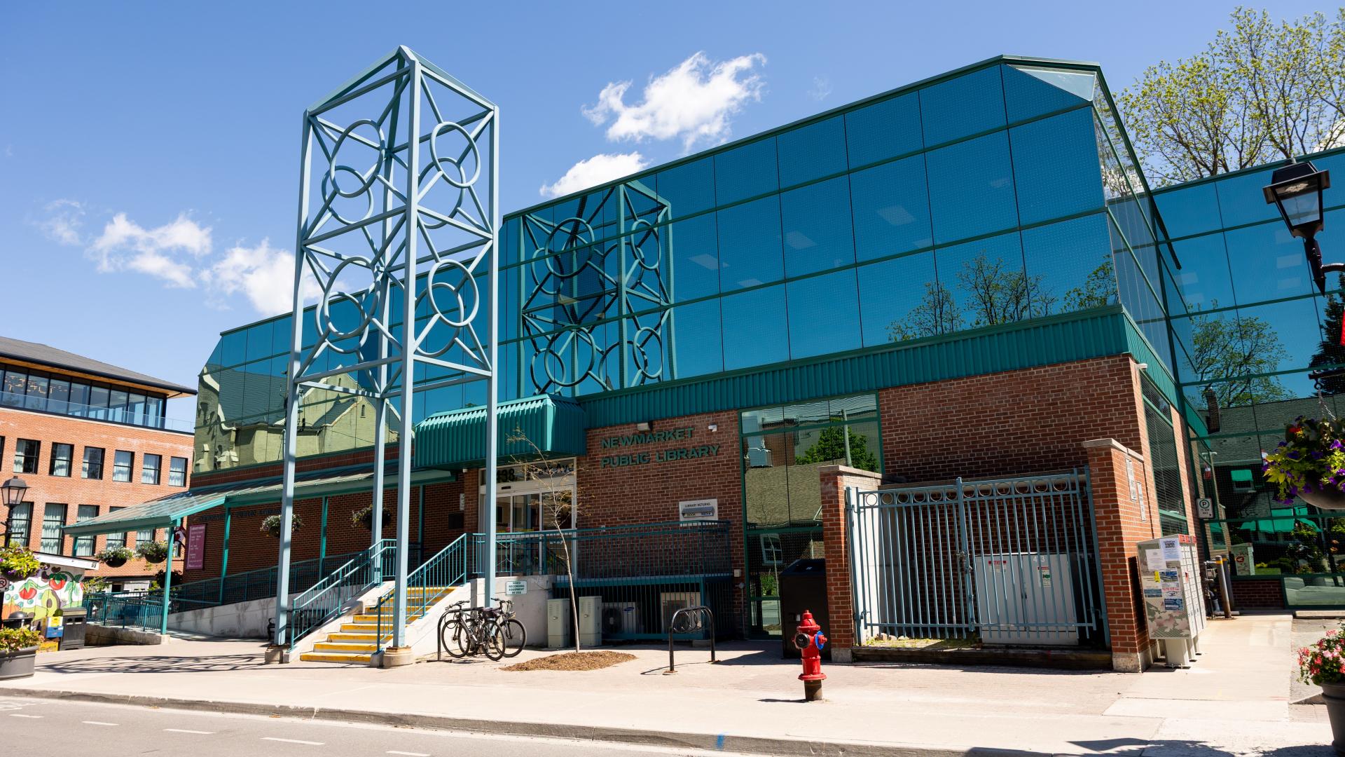 library building with glass and brick facade