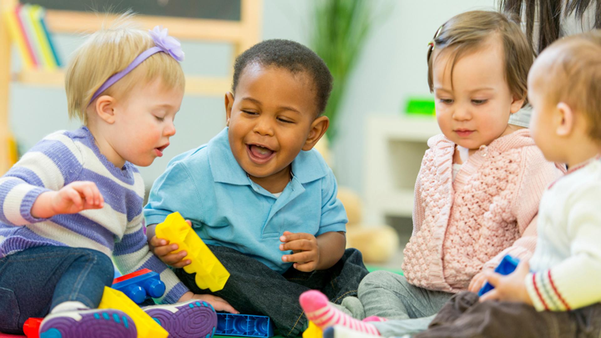 group of babies in program