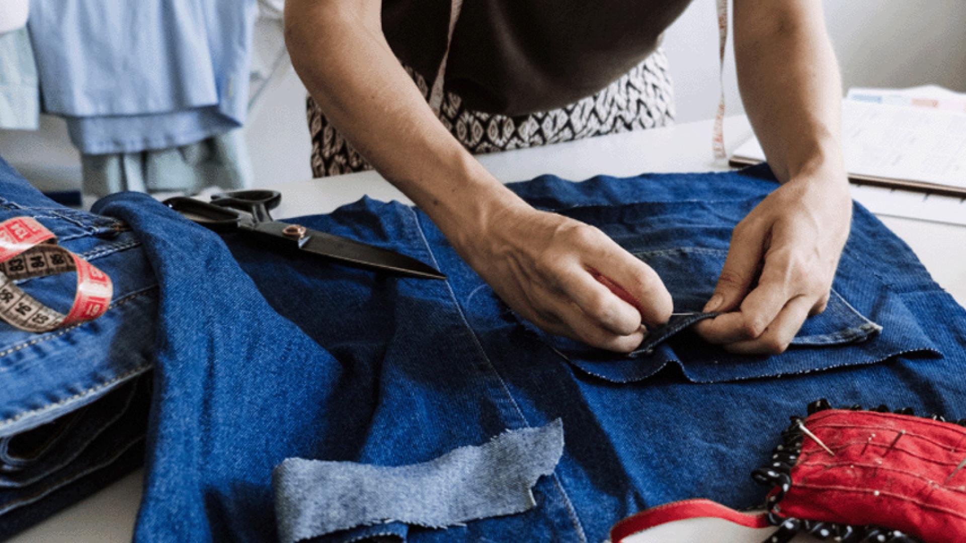 Woman repairing clothing