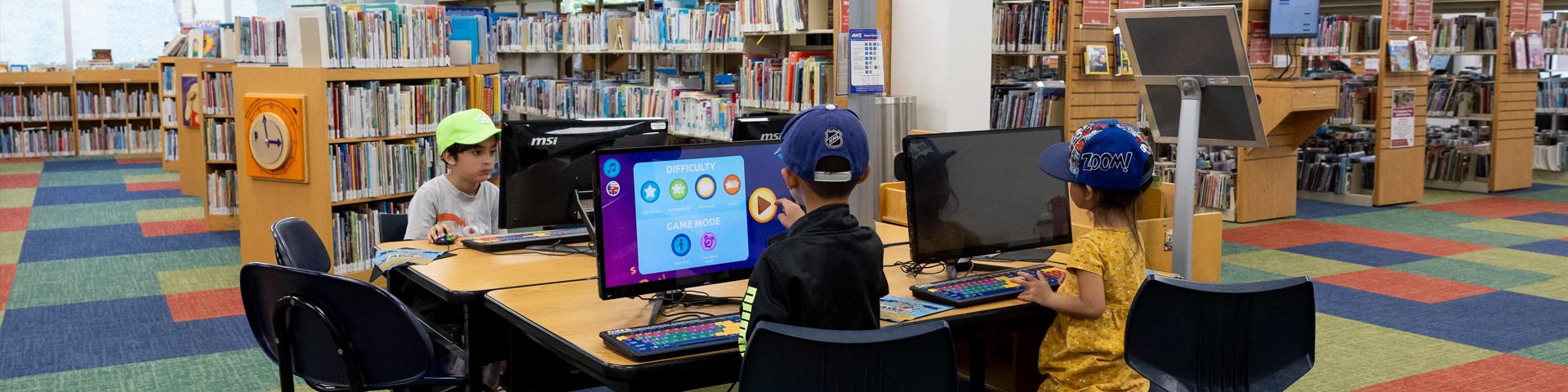 children at the kids computers in the children's department